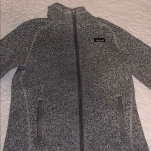 A grey trendy Patagonia jacket